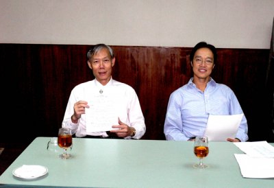 Acting Chairman Alfred Ho and Hon Treasurer  Aaron Chiang presenting at the AGM 1.jpg
