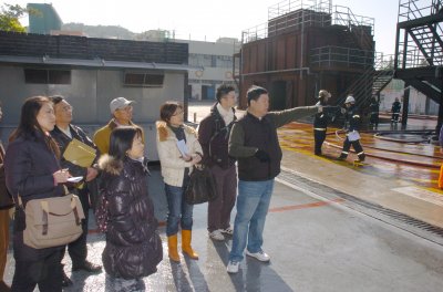 Centre Manager explains fire demonstration.JPG