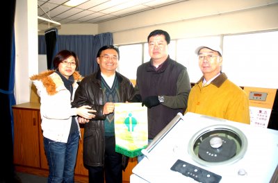 Presentation of a Souvenir to MSTI.JPG